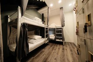 Postelja oz. postelje v sobi nastanitve 小艾背包客棧 Small Eye Backpacker