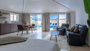 A seating area at Villa Victoria With Heated Pool