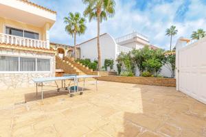 A balcony or terrace at Villa Victoria With Heated Pool