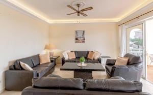 A seating area at Villa Victoria With Heated Pool