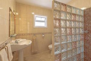 A bathroom at Villa Victoria With Heated Pool