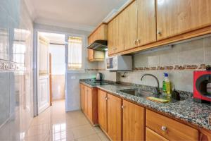 A kitchen or kitchenette at Amazing View Apt By Dream Homes Tenerife