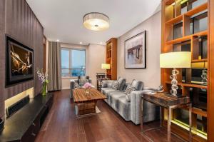 TV o dispositivi per l'intrattenimento presso Ascott Huai Hai Road Shanghai, Xintiandi