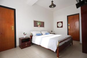 Postel nebo postele na pokoji v ubytování Hotel Barracuda