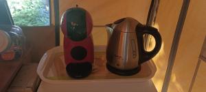 a kitchen appliance sitting on top of a shelf at Tente safari au Pont du Gard in Vers Pont du Gard