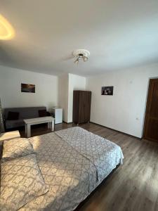 Letto o letti in una camera di My House Kvariati