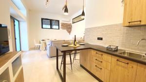 Kuchyň nebo kuchyňský kout v ubytování Urban Suites - B&B