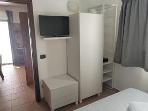 Postel nebo postele na pokoji v ubytování Casavacanze corallo