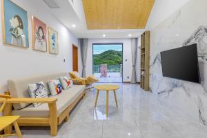 Μια τηλεόραση ή/και κέντρο ψυχαγωγίας στο Zhangjiajie Guanshan Beiyuan