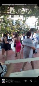 a group of people standing around in a room at Vila Vukotić in Petrovac na Moru