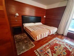 Postel nebo postele na pokoji v ubytování KYOMU Resort
