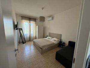 Postel nebo postele na pokoji v ubytování B&B Casarco