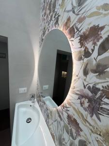 Koupelna v ubytování B&B I versi del mare + 37 fotografií