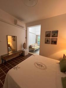 Postel nebo postele na pokoji v ubytování B&B I versi del mare