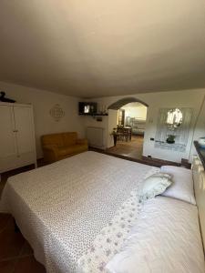 Posteľ alebo postele v izbe v ubytovaní la casa nel bosco