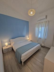 Ένα ή περισσότερα κρεβάτια σε δωμάτιο στο Soleil 24