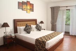 Postel nebo postele na pokoji v ubytování Oreeka - Katunayake Airport Transit Hotels + 37 fotografií