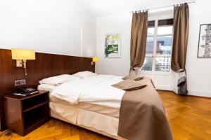 Voodi või voodid majutusasutuse J5 Hotels Helvetie & La Brasserie toas