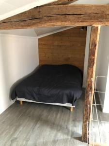 En eller flere senge i et værelse på Maison Loft Saint-Dizier