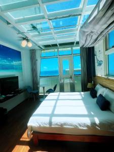 Letto o letti in una camera di Water Ripple