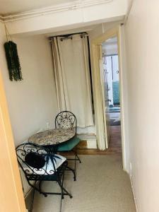 Χώρος καθιστικού στο Cozy studio opposite Chelsea stadium