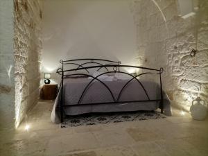 Postel nebo postele na pokoji v ubytování Le TRE ALCOVE