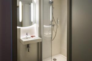Koupelna v ubytování Ibis Budget Lyon Est Saint Quentin Fallavier