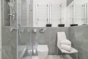 Kúpeľňa v ubytovaní Spa Residence Carbona Hévíz Apartments KAKADU 203 A