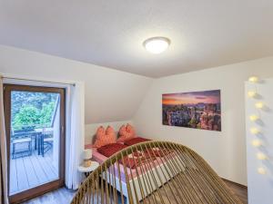 Postel nebo postele na pokoji v ubytování B6 - Urlaubsmagie - Inmitten der Sächsischen Schweiz mit Balkon mit Ausblick auf die Sandsteine