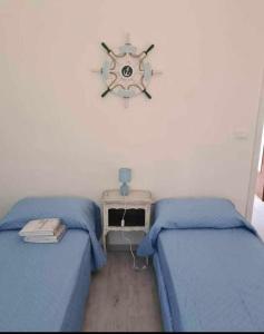 Postel nebo postele na pokoji v ubytování Casa di Lalla + 2 fotografie
