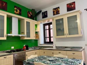 Kuchyň nebo kuchyňský kout v ubytování Casa Calandra + 19 fotografií