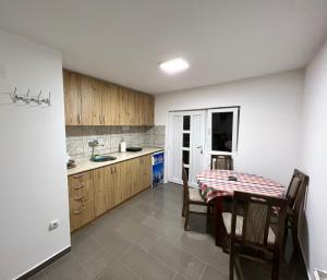 Kuchyň nebo kuchyňský kout v ubytování Apartment Velago