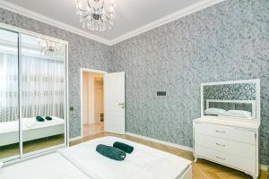 Ένα ή περισσότερα κρεβάτια σε δωμάτιο στο Winter Park Residence