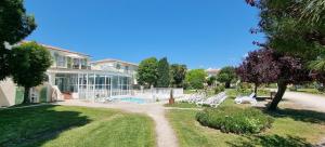 Κήπος έξω από το Appartement 91 Palais des Gouverneurs Jardin Piscine Sauna Hammam Sport