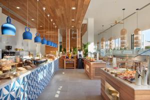 a large bakery with a lot of food on display at Melia Ibiza - Adults Only in Santa Eularia des Riu