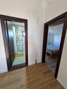 Voodi või voodid majutusasutuse Che Private Rooms Banovci toas
