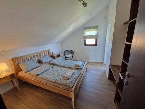 Voodi või voodid majutusasutuse Che Private Rooms Banovci toas