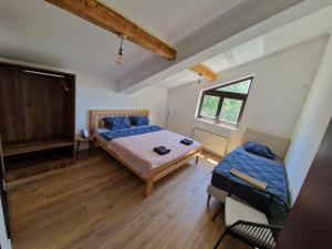 Voodi või voodid majutusasutuse Che Private Rooms Banovci toas