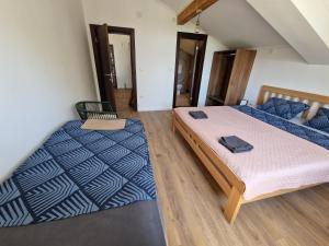 Voodi või voodid majutusasutuse Che Private Rooms Banovci toas