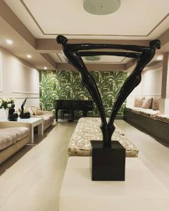 Postel nebo postele na pokoji v ubytování Bianco Riccio Suite Hotel