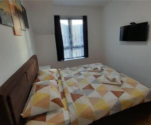 Una cama o camas en una habitación de APARTMaN HAPPY PLACE