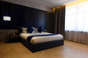 Ulaanbaatar Hotel客房内的一张或多张床位