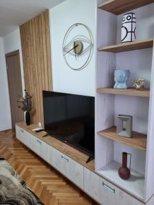 TV a/nebo společenská místnost v ubytování Marlux