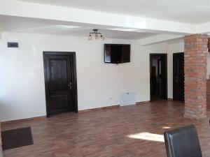 Μια τηλεόραση ή/και κέντρο ψυχαγωγίας στο Casa Gospodarului