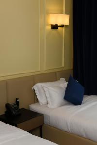 Ulaanbaatar Hotel客房内的一张或多张床位
