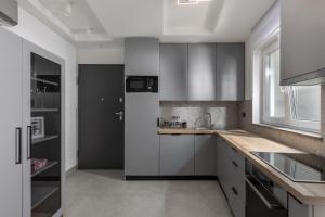 Kuchyň nebo kuchyňský kout v ubytování Apartment One Kostrena - Happy Rentals