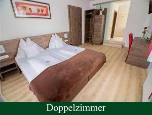Postel nebo postele na pokoji v ubytování Wallseerhof