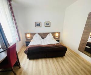 Postel nebo postele na pokoji v ubytování Wallseerhof