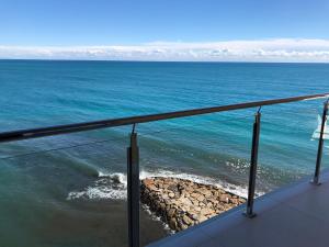 a view of the ocean from a balcony at INNSiDE by Meliá Alicante Porta Maris in Alicante
