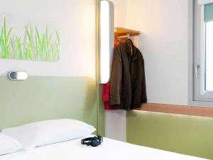 Postel nebo postele na pokoji v ubytování ibis budget Beaconsfield